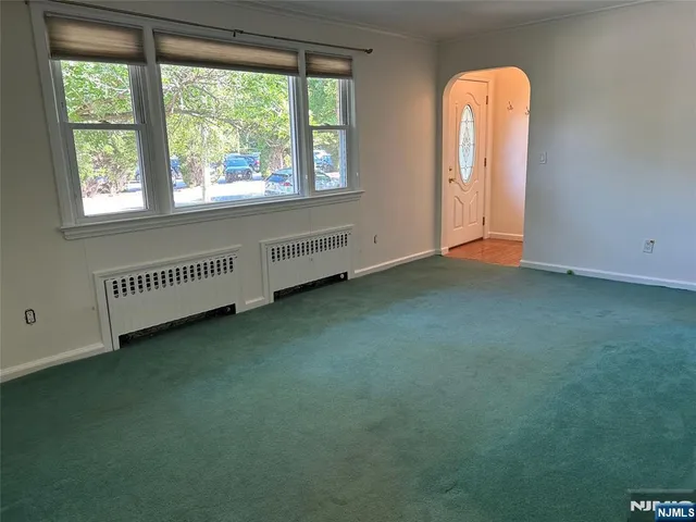 an empty room with a window