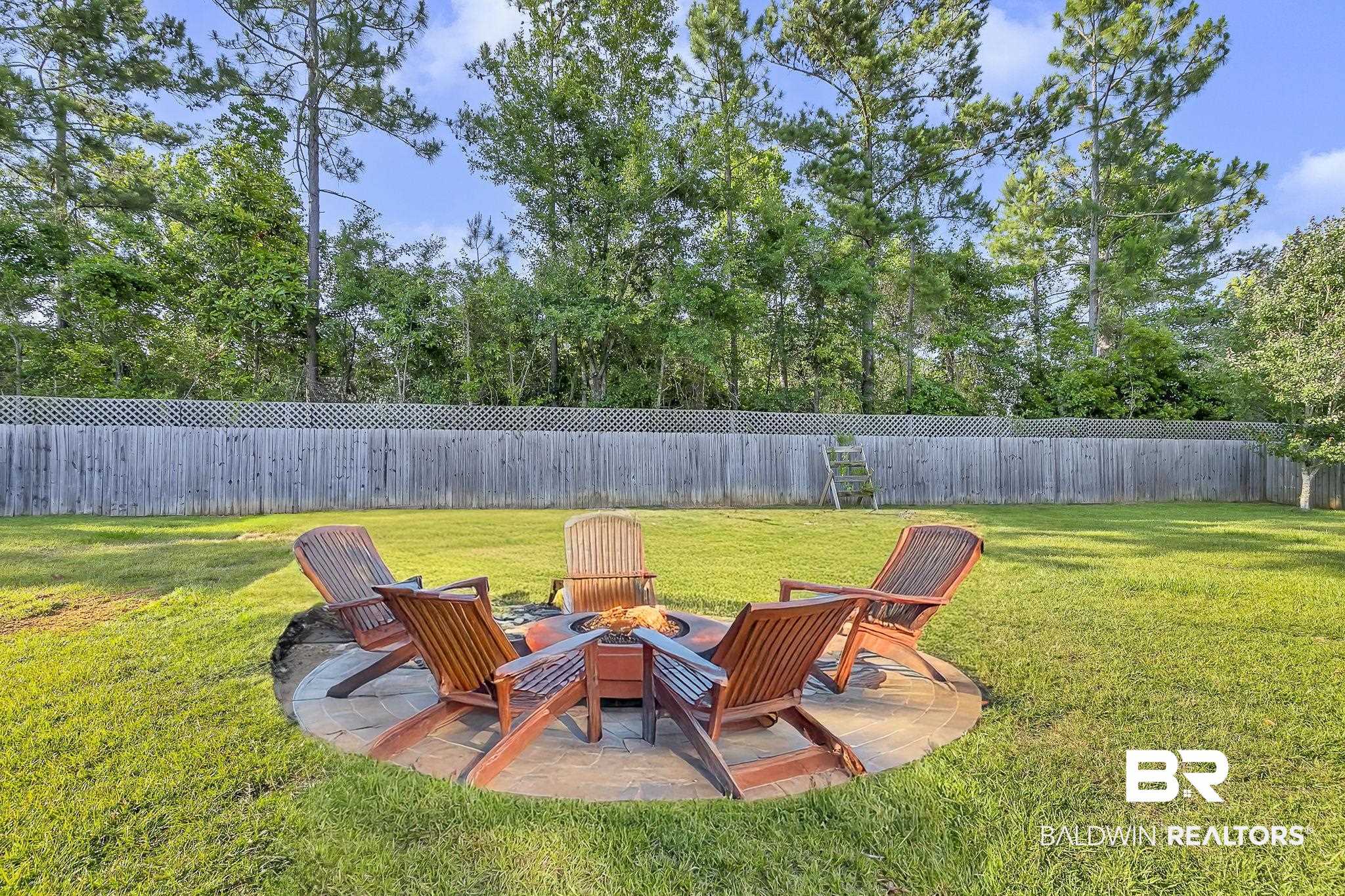 30635 Drayton Court Daphne, AL 36527 - Photo 44 of 51 View of yard with an outdoor fire pit and a patio