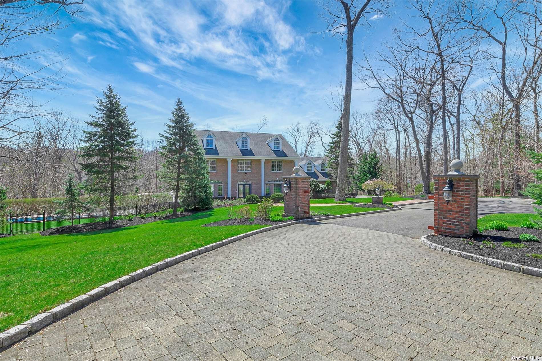 7 Fox Run Nissequogue, NY 11780 - Photo 1 of 1 a view of a house with a big yard and large trees