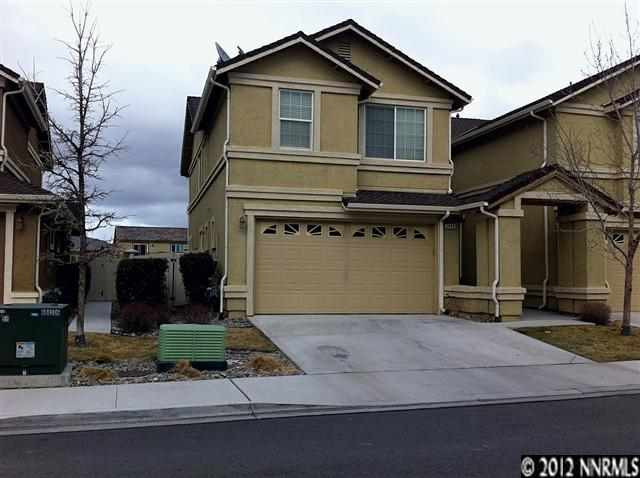 1849 Resistol Drive Reno, NV 89521 - Photo 1 of 1 a front view of a house with garden