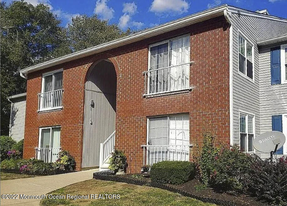511-7 Harding Road Freehold, NJ 07728 - Photo 1 of 19 a front view of a house with a yard