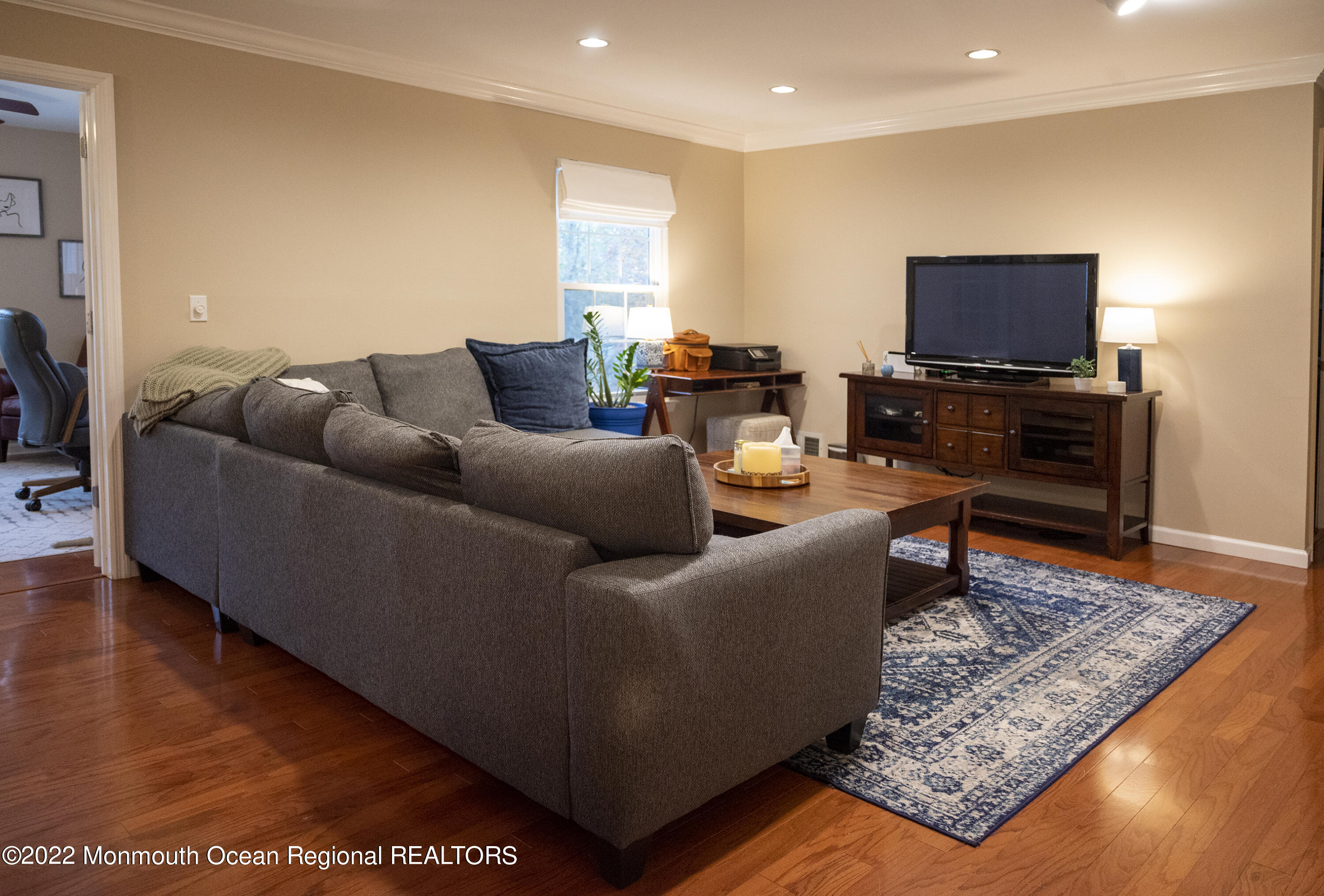 511-7 Harding Road Freehold, NJ 07728 - Photo 7 of 19 a living room with furniture and a flat screen tv