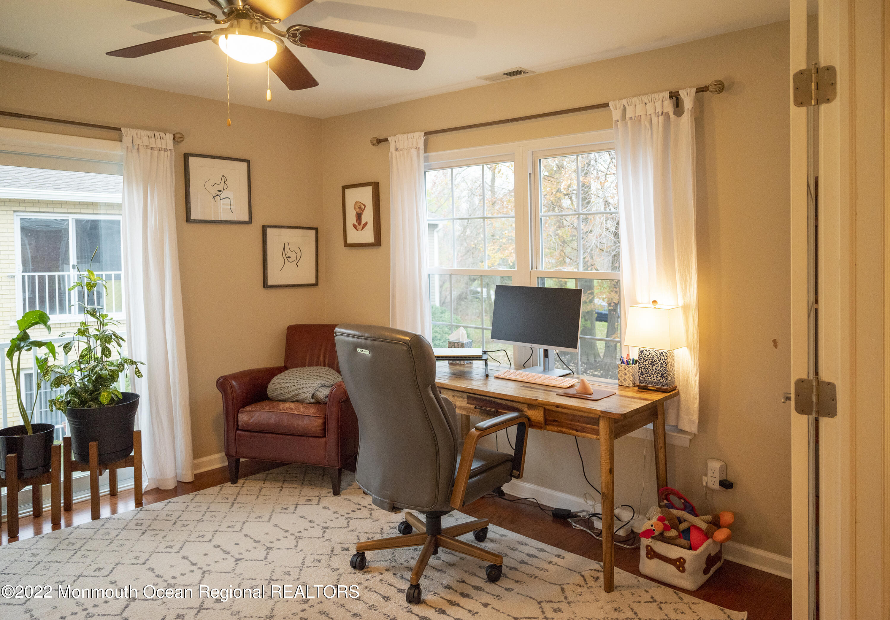 511-7 Harding Road Freehold, NJ 07728 - Photo 9 of 19 a view of a workspace with furniture and a window