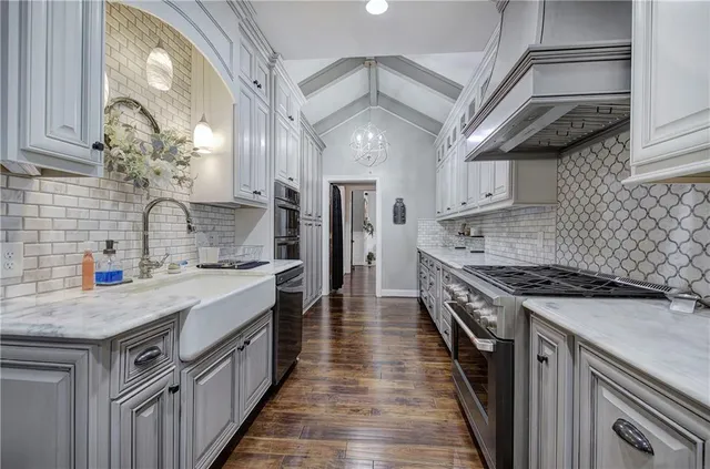 a living room with furniture fireplace and flat screen tv