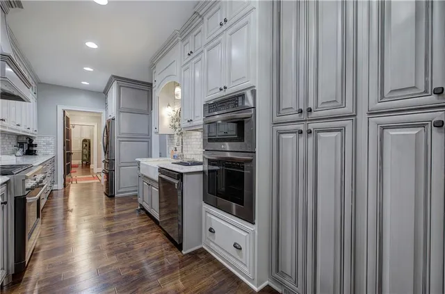 a view of a livingroom with furniture window and wooden floor