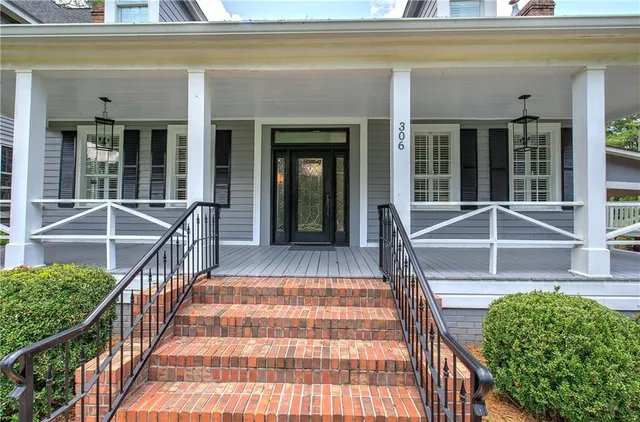 a room with wooden floor and a window