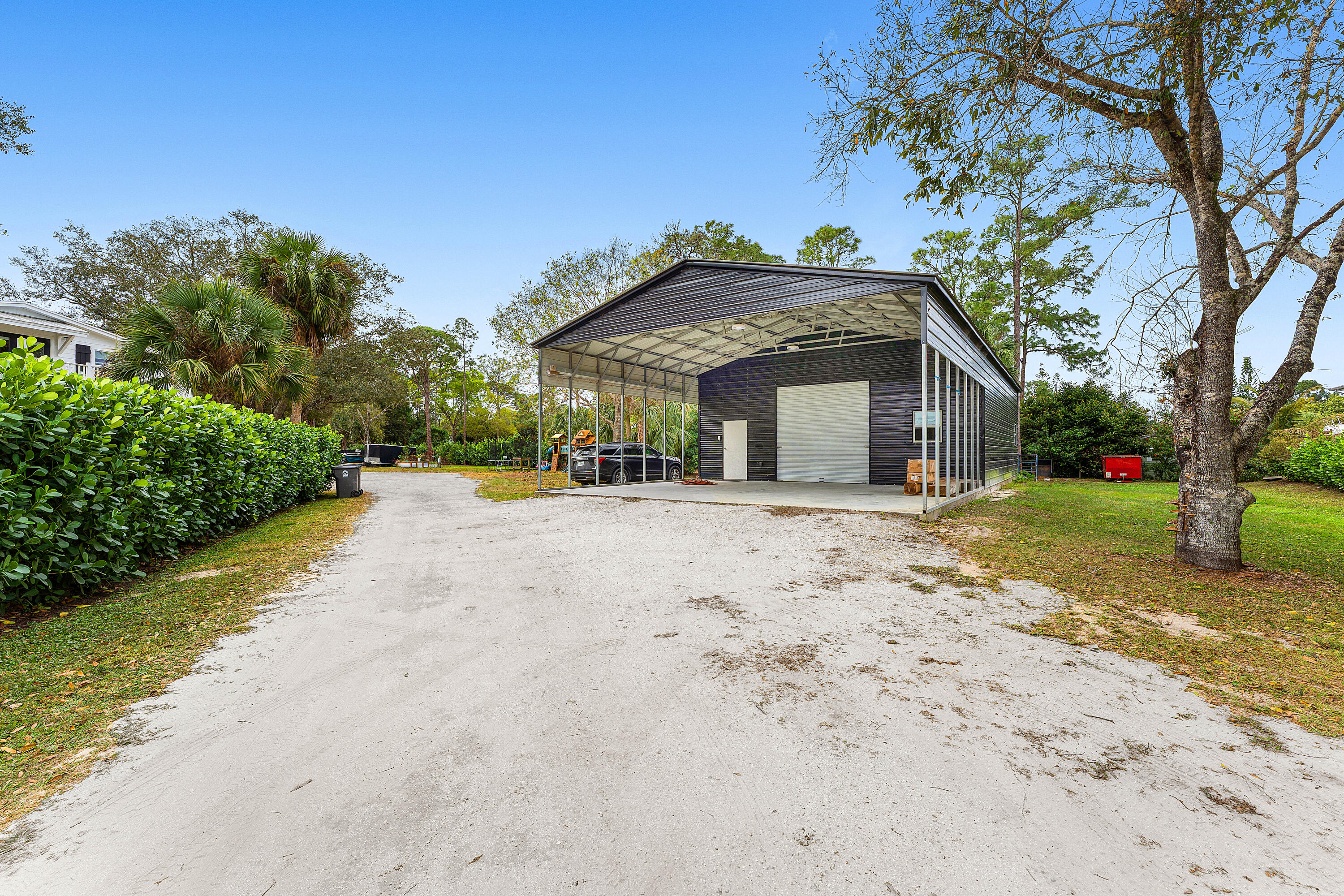 16823 127th Drive North Jupiter, FL 33478 - Photo 5 of 7 048-16823127thDriveNorth-Jupiter-FL-3347