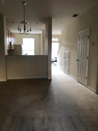 a view of a chandelier in a room