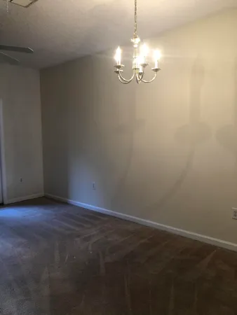 a view of a livingroom with a chandelier