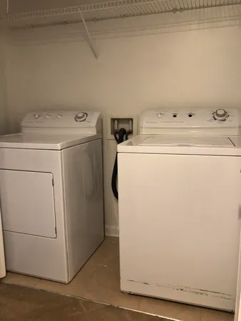 a bathroom with a toilet and a bathtub