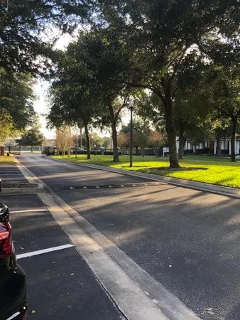 a view of a swimming pool with an outdoor space and seating
