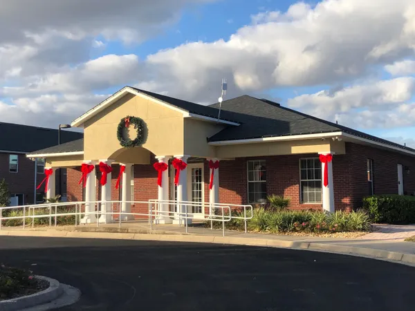 a view of a lake with a house