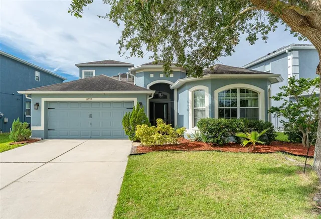 front view of a house with a yard