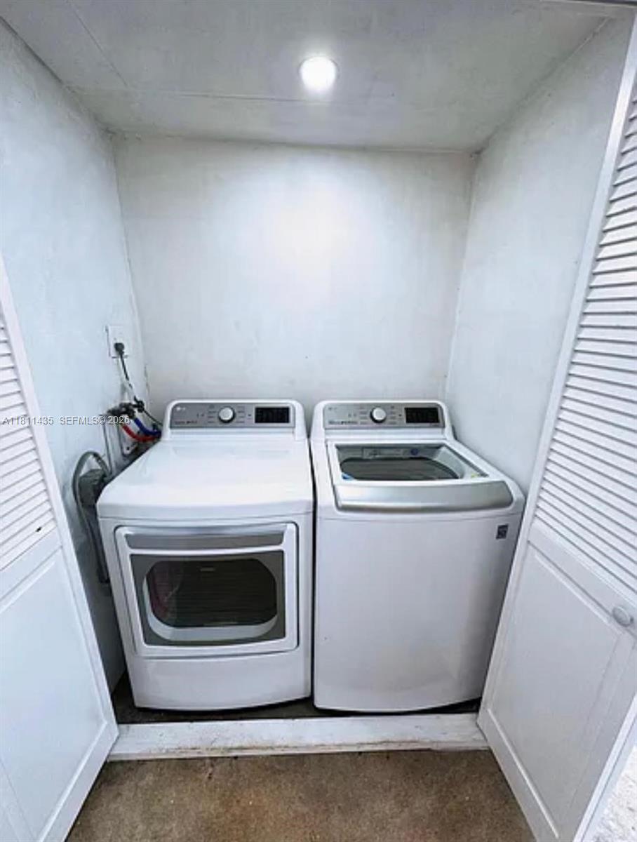 1237 Northwest 33rd Avenue Miami, FL 33125 - Photo 11 of 35 a utility room with dryer and washer