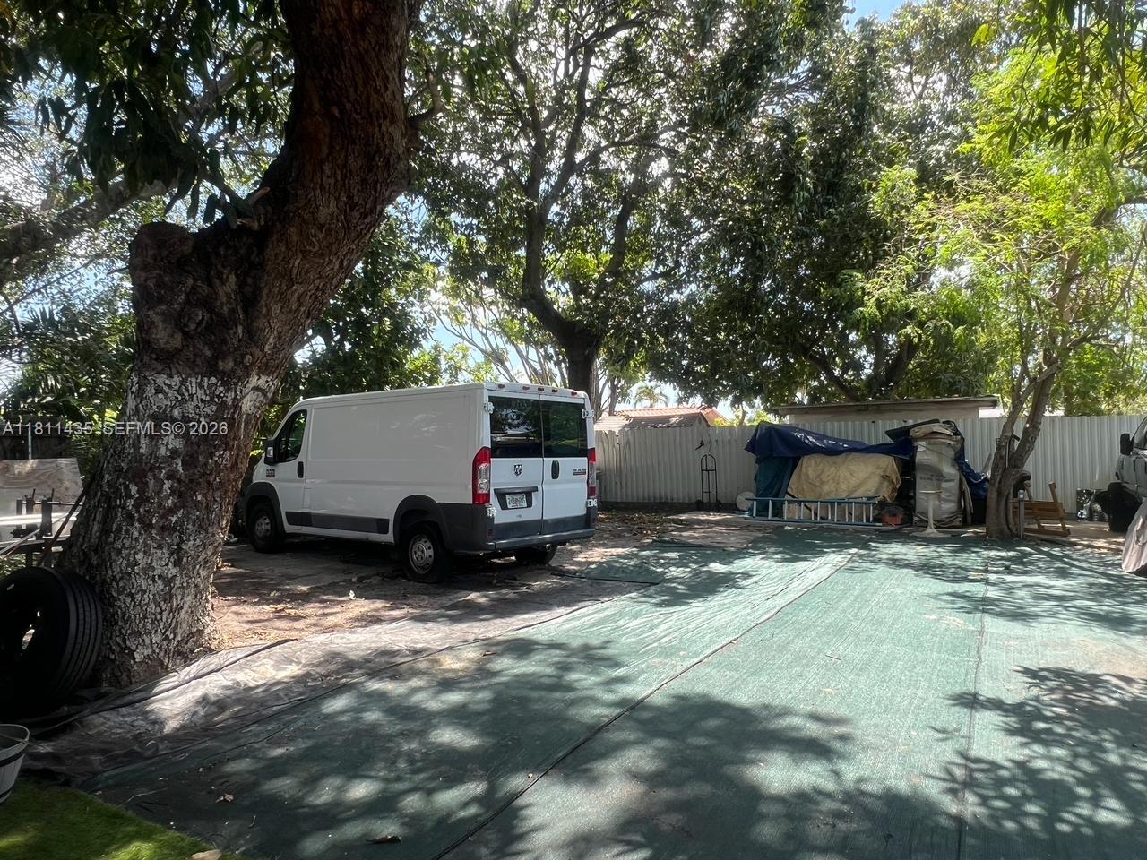 1237 Northwest 33rd Avenue Miami, FL 33125 - Photo 12 of 35 a view of a house with a tree