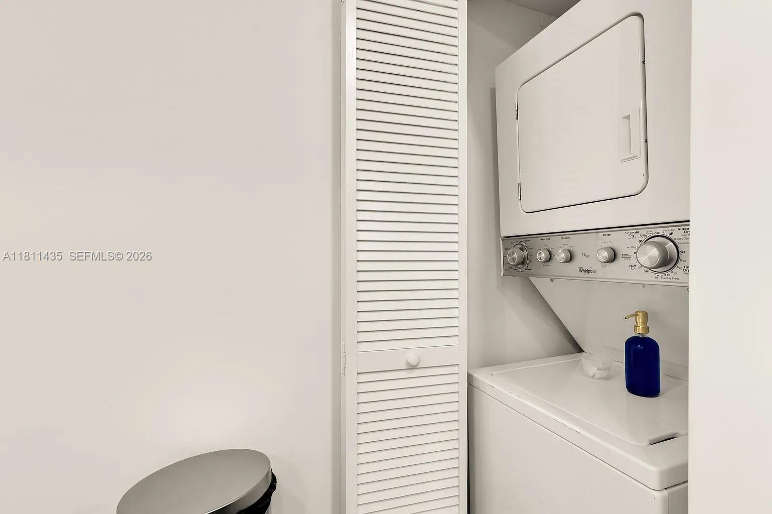 1237 Northwest 33rd Avenue Miami, FL 33125 - Photo 27 of 35 a bathroom with a sink and a mirror