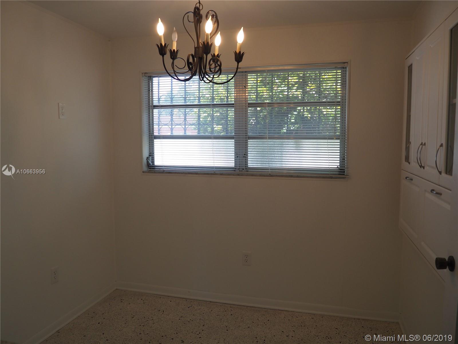 180 Northwest 59th Court Miami, FL 33126 - Photo 13 of 28 Dining Room with built-in cabinets.