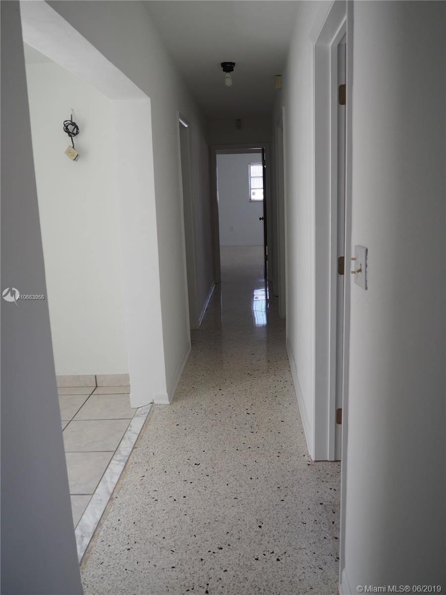 180 Northwest 59th Court Miami, FL 33126 - Photo 14 of 28 Hallway leading to Bedrooms and Bathrooms.