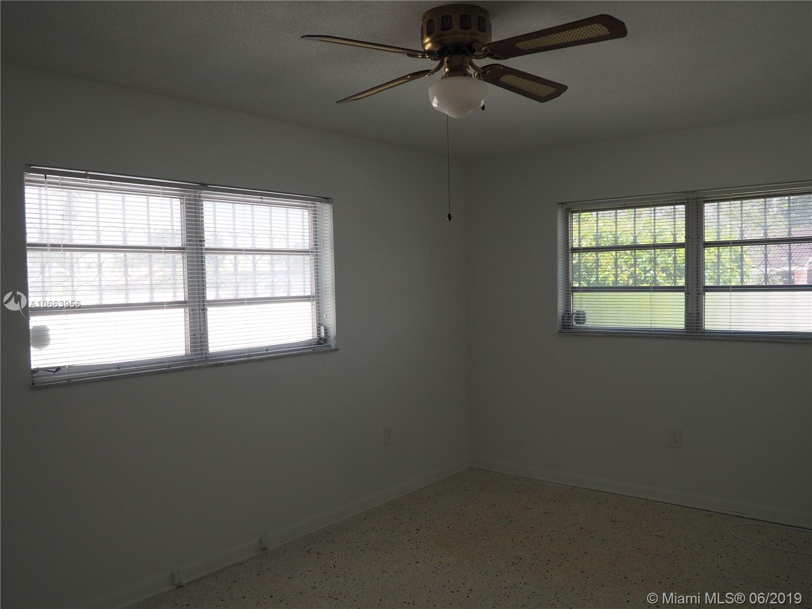 180 Northwest 59th Court Miami, FL 33126 - Photo 23 of 28 Master Bedroom with lots off natural light.