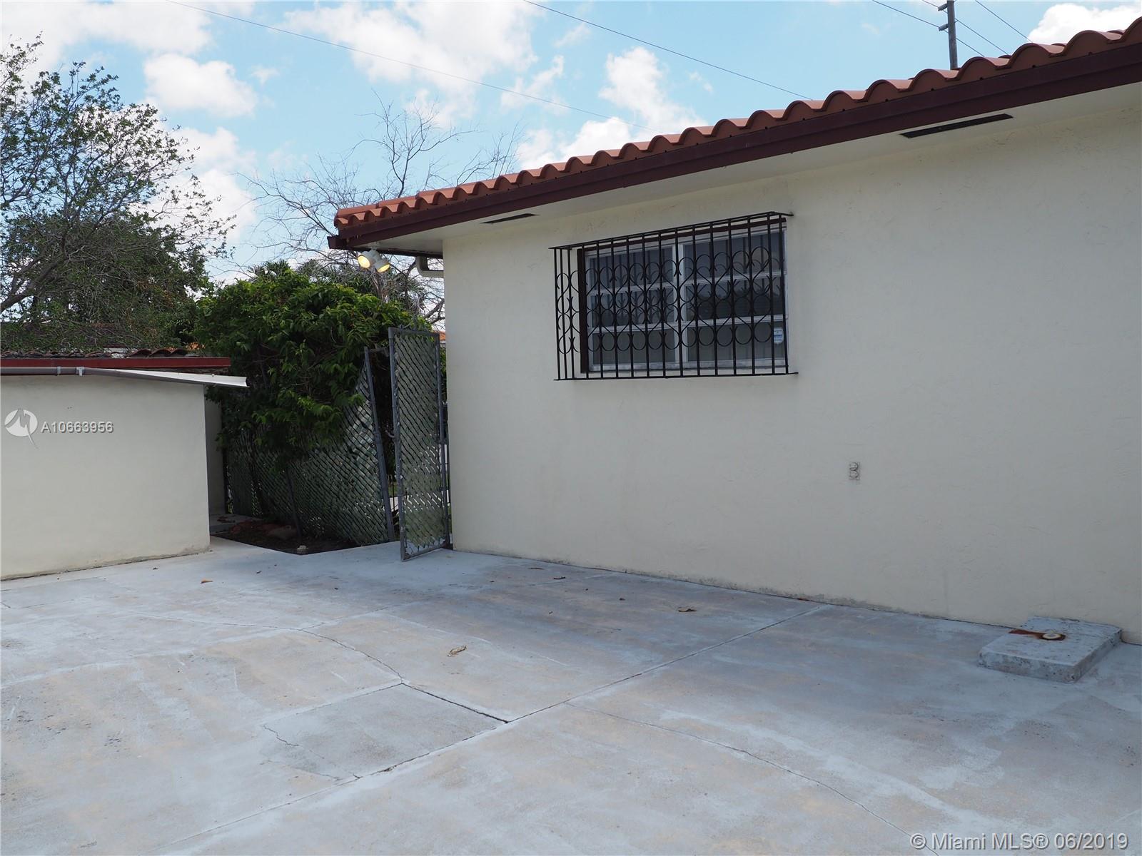 180 Northwest 59th Court Miami, FL 33126 - Photo 28 of 28 Courtyard with CBS shed.