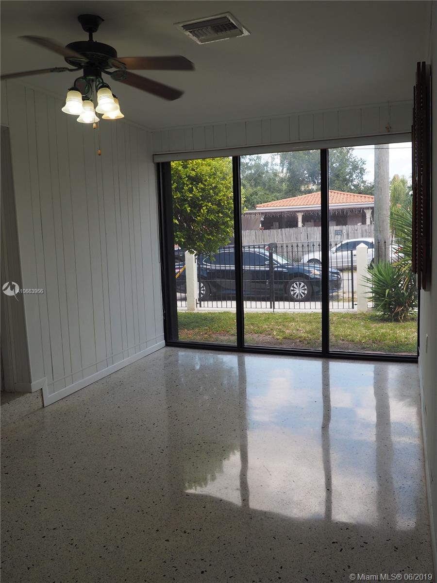 180 Northwest 59th Court Miami, FL 33126 - Photo 7 of 28 Family Room with Impact Picture Window