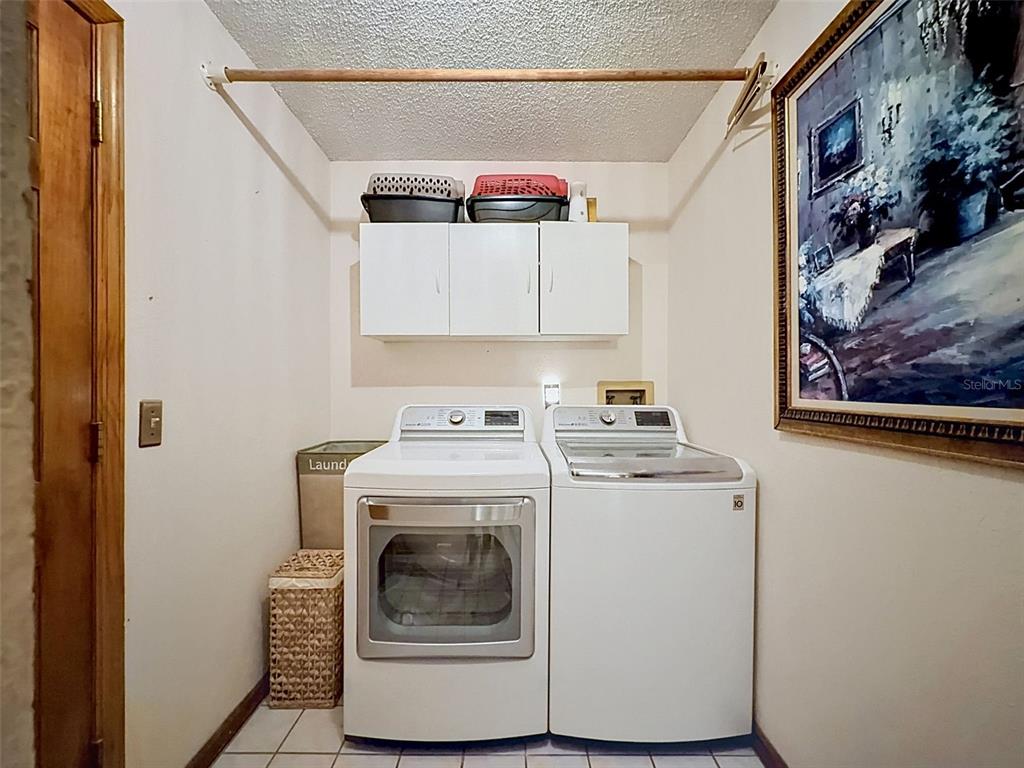 7111 Ricker Avenue Webster, FL 33597 - Photo 31 of 41 a utility room with dryer and washer