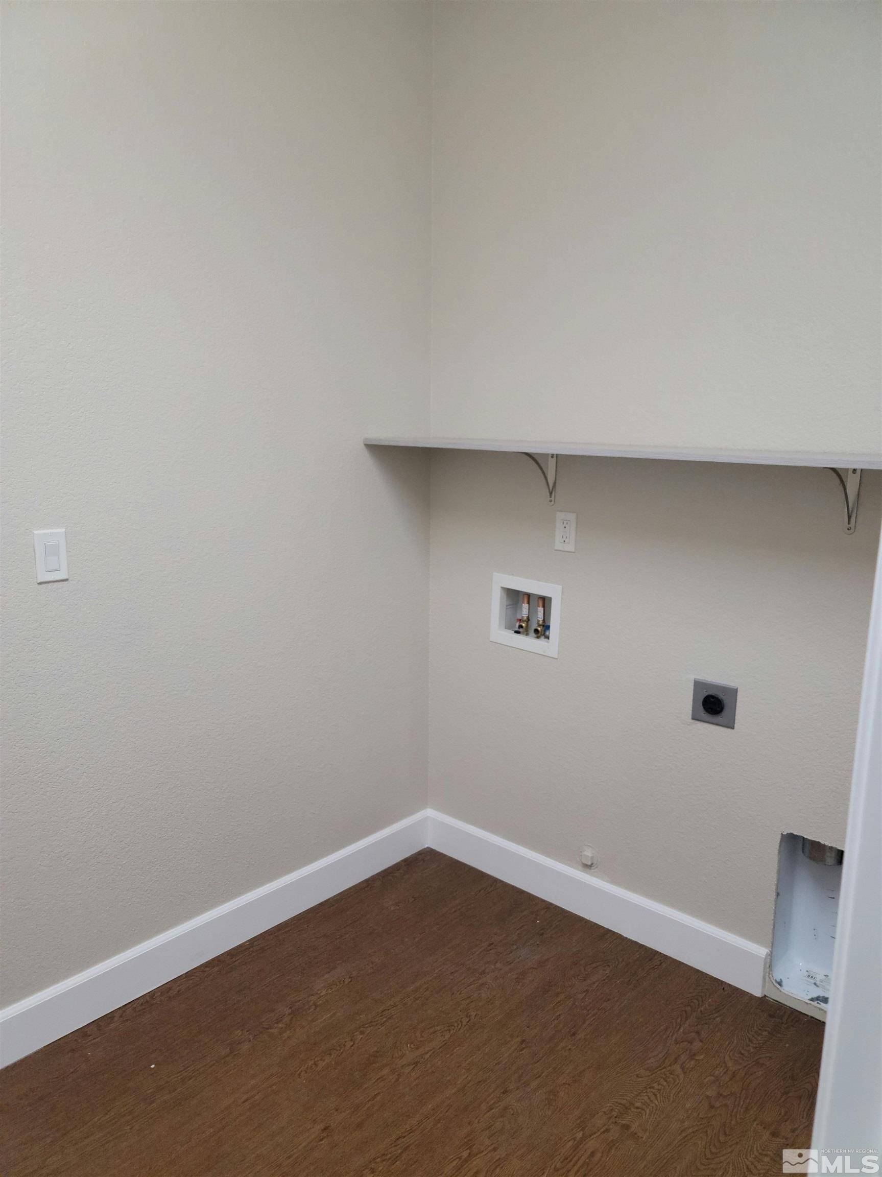 591 White Eagle Lane Fernley, NV 89408 - Photo 13 of 22 an empty room with a workbench
