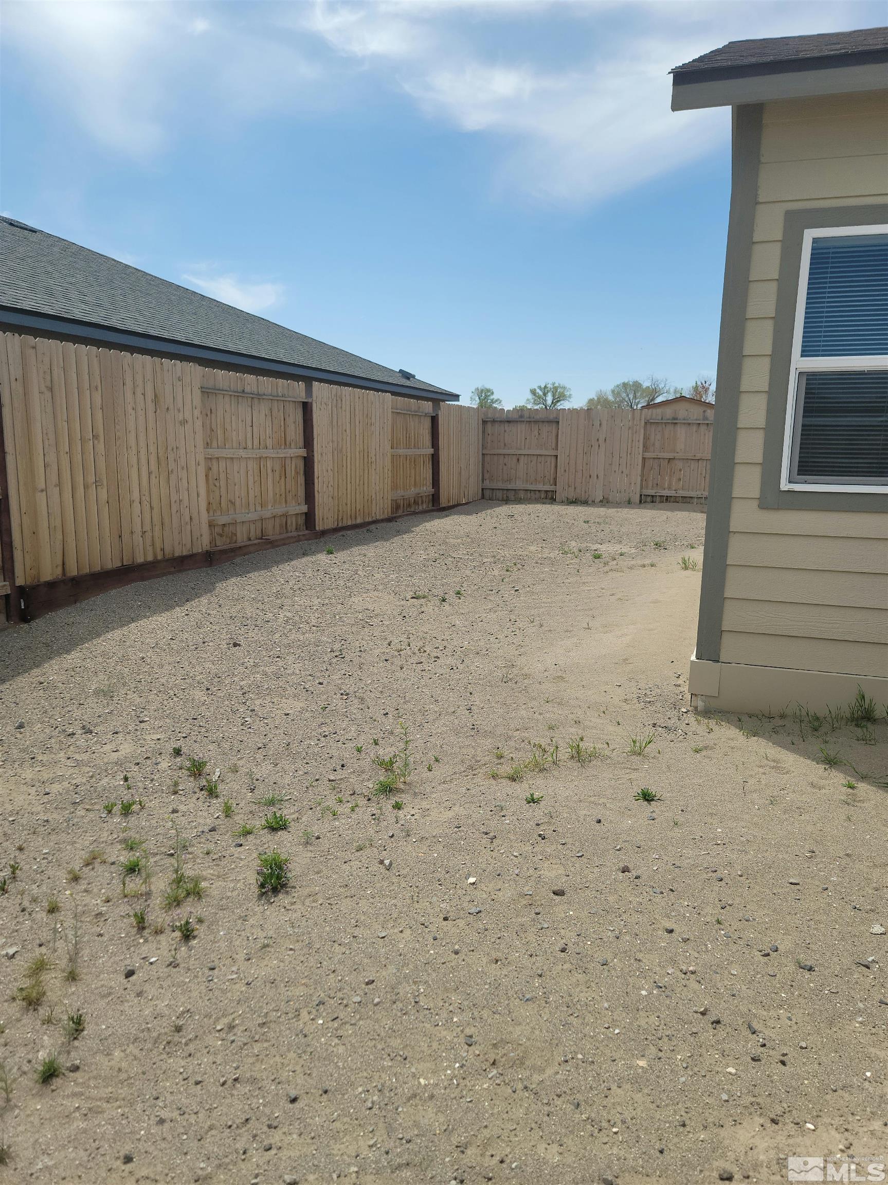 591 White Eagle Lane Fernley, NV 89408 - Photo 22 of 22 a view of a backyard