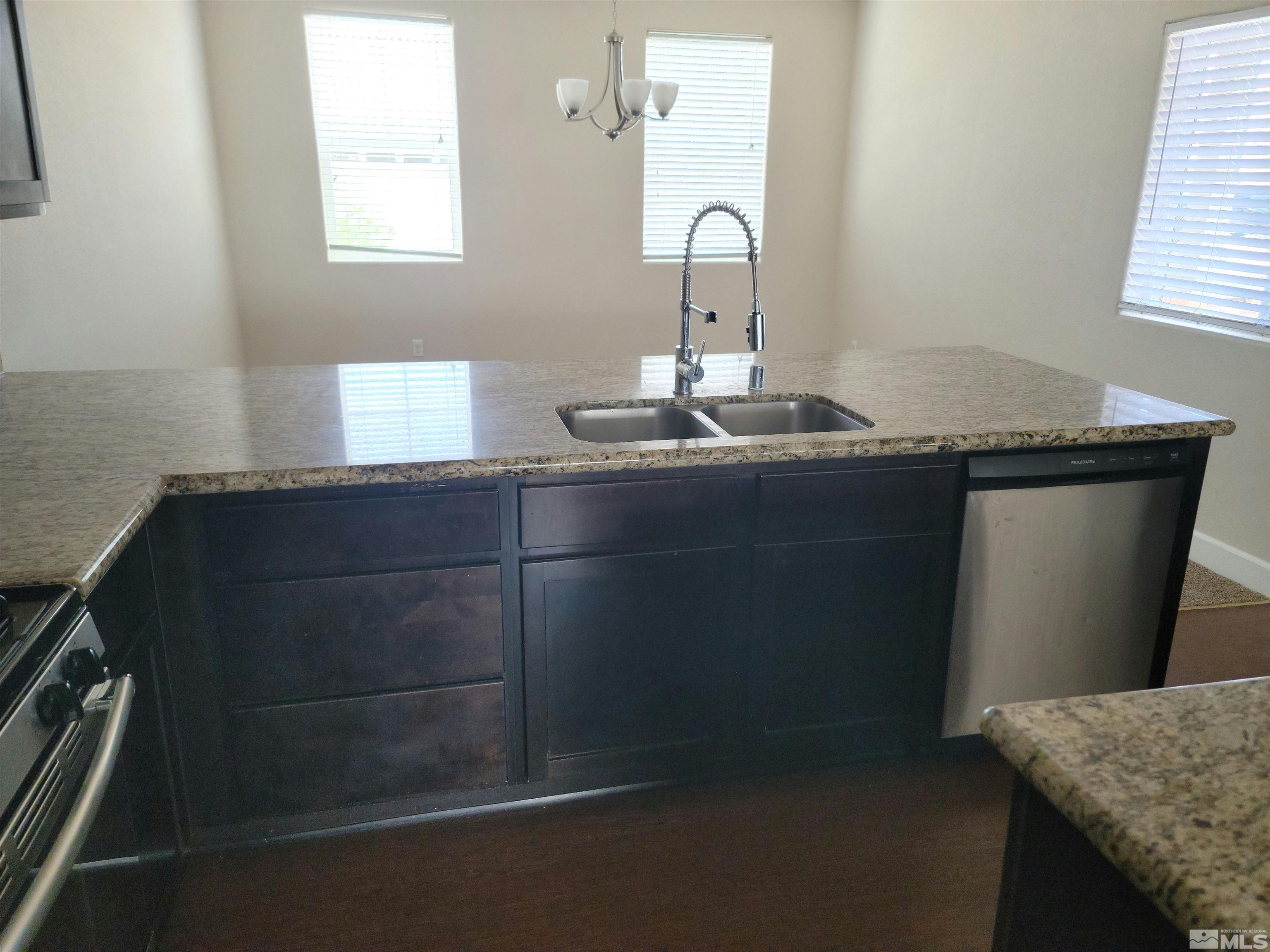 591 White Eagle Lane Fernley, NV 89408 - Photo 7 of 22 a close view of sink and tap