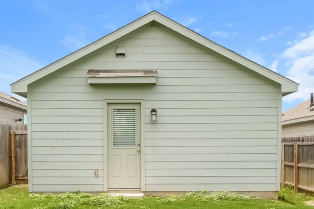 a front view of a house with garage