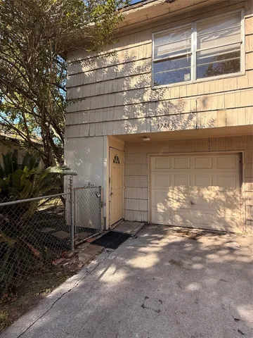 a view of a house with a street