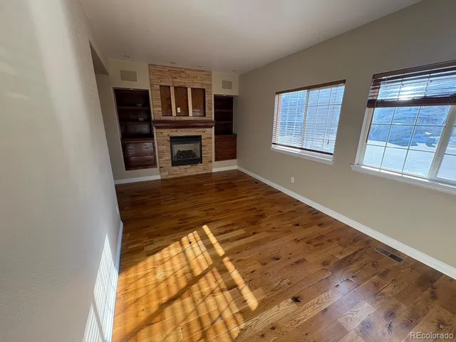 a view of a livingroom with a fireplace