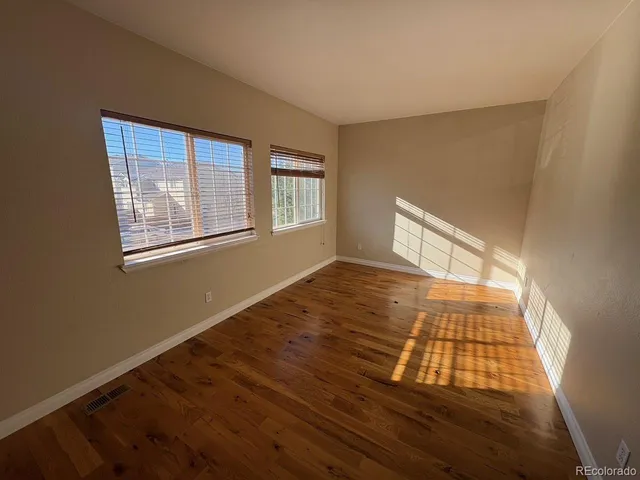 a kitchen with a stove a sink and a refrigerator