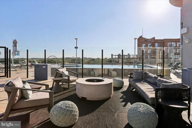 a view of a patio with swimming pool
