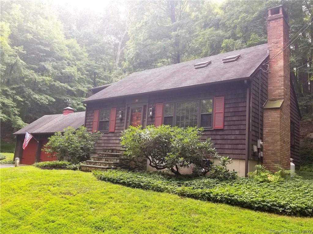 22 West Redding Road Danbury, CT 06810 - Photo 1 of 1 a front view of a house with a yard