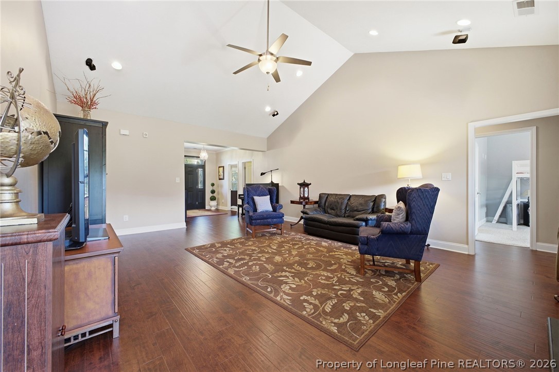 2589 June Johnson Road Raeford, NC 28376 - Photo 15 of 49 a living room with furniture rug and wooden floor