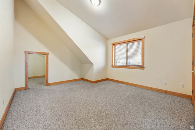605 North Loafer Canyon Road Elk Ridge, UT 84651 - Photo 13 of 53 Bedroom 2. featuring small door to kids play area.