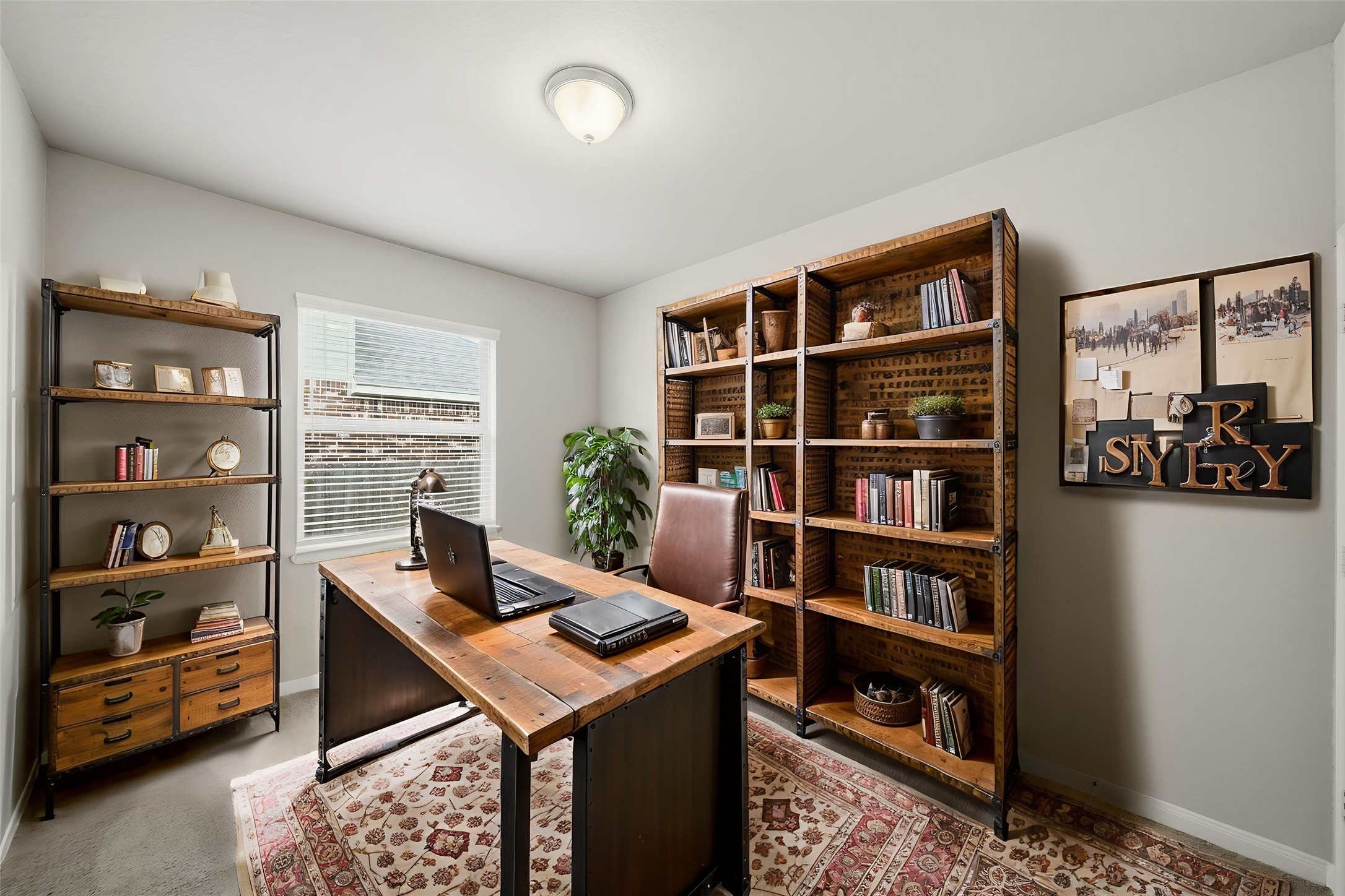 6010 Kolle Drive Rosenberg, TX 77471 - Photo 20 of 45 a view of a workspace with furniture and a book shelf