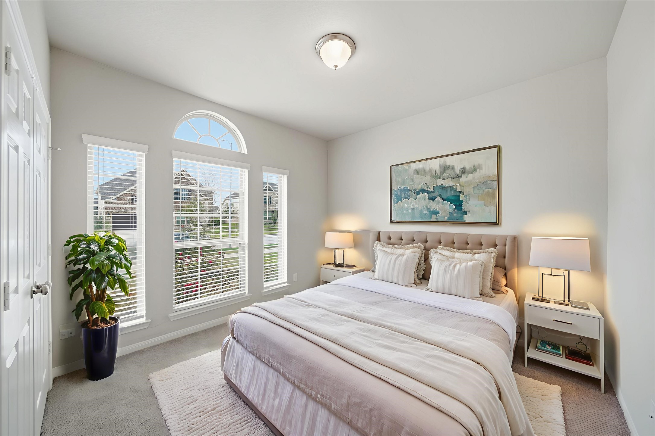 6010 Kolle Drive Rosenberg, TX 77471 - Photo 31 of 45 a bedroom with a balcony a bed and a window