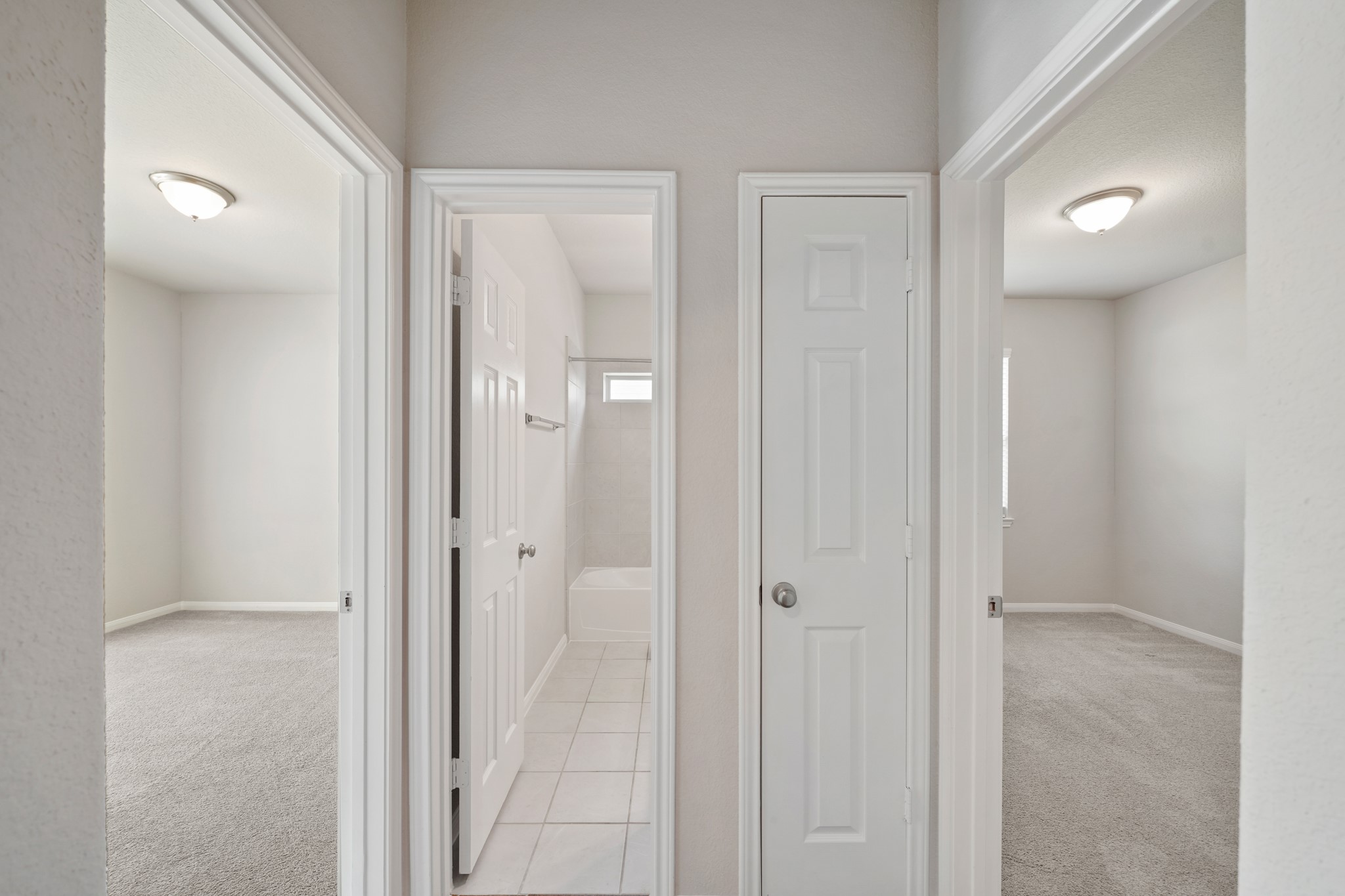 6010 Kolle Drive Rosenberg, TX 77471 - Photo 34 of 45 a view of a bathroom from the hallway