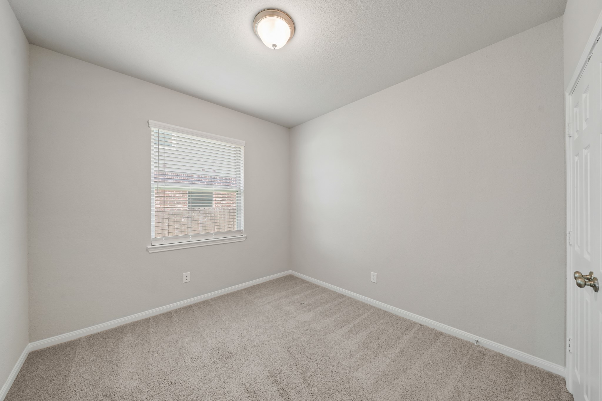 6010 Kolle Drive Rosenberg, TX 77471 - Photo 37 of 45 an empty room with a window
