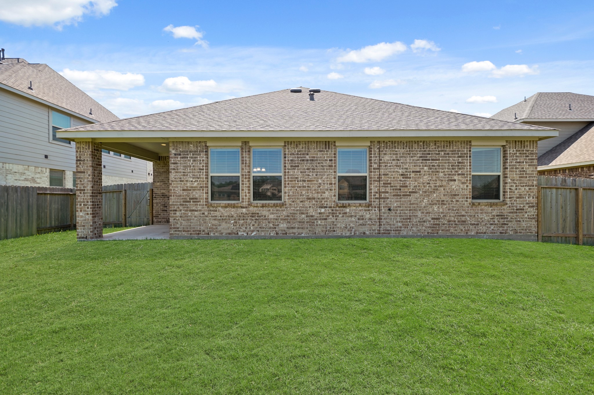 6010 Kolle Drive Rosenberg, TX 77471 - Photo 42 of 45 a front view of a house with a garden
