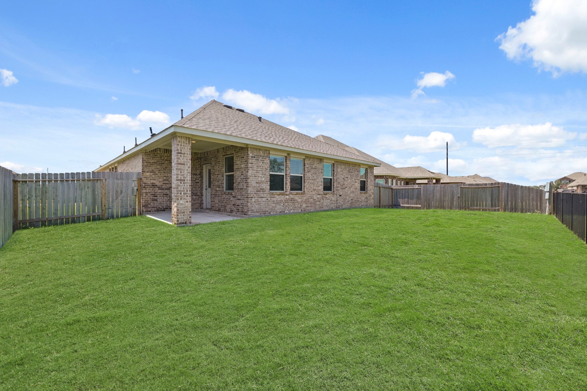 6010 Kolle Drive Rosenberg, TX 77471 - Photo 43 of 45 a front view of house with a garden
