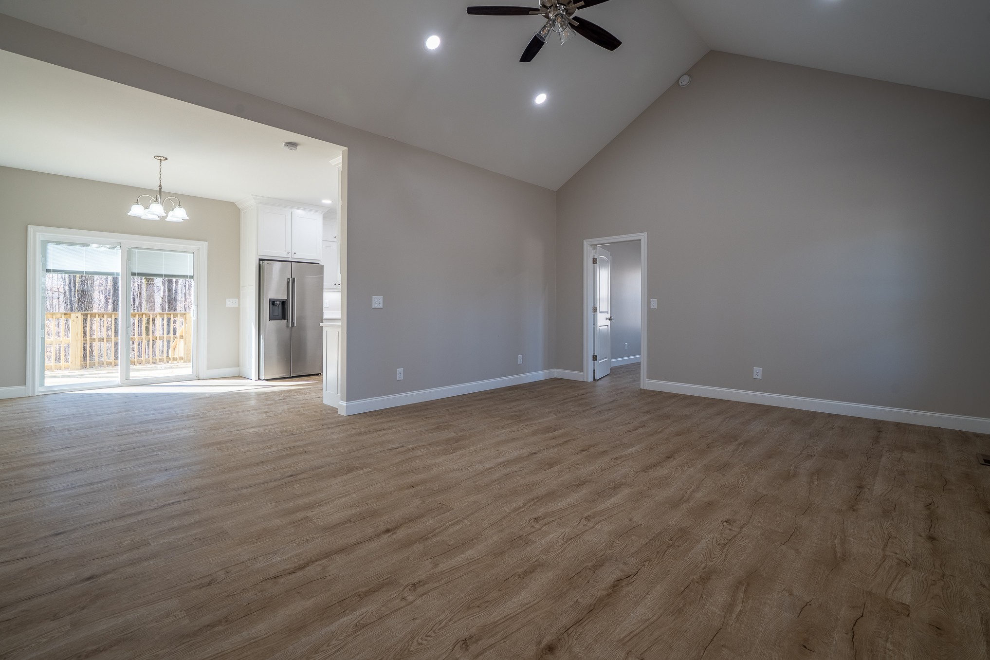 32 Periwinkle Path Leoma, TN 38468 - Photo 11 of 28 an empty room with wooden floor and windows