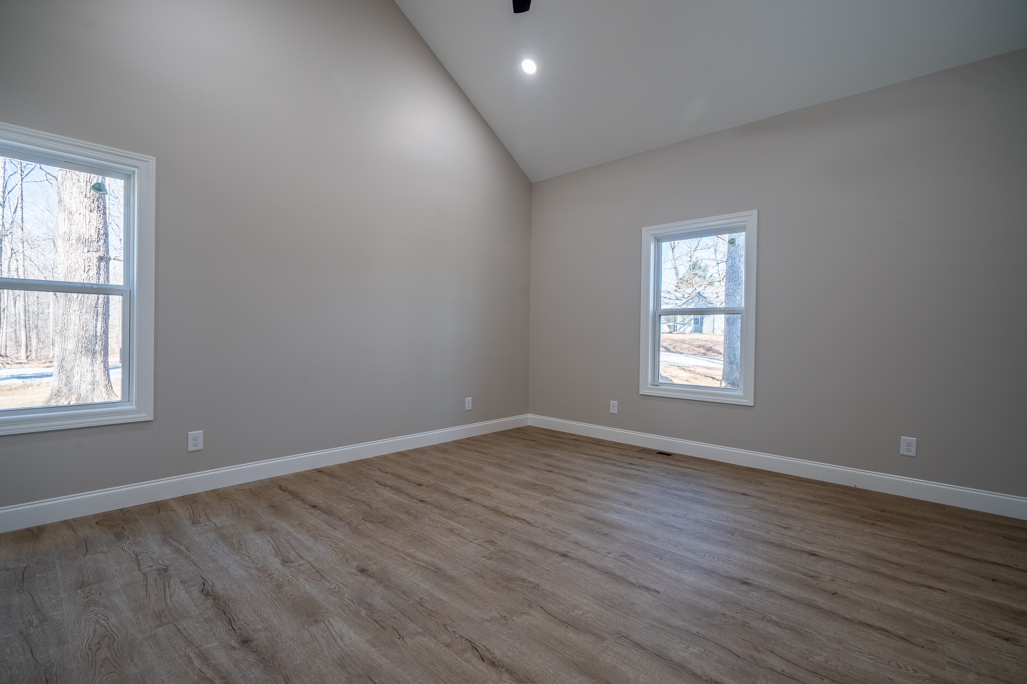 32 Periwinkle Path Leoma, TN 38468 - Photo 16 of 28 an empty room with wooden floor and windows