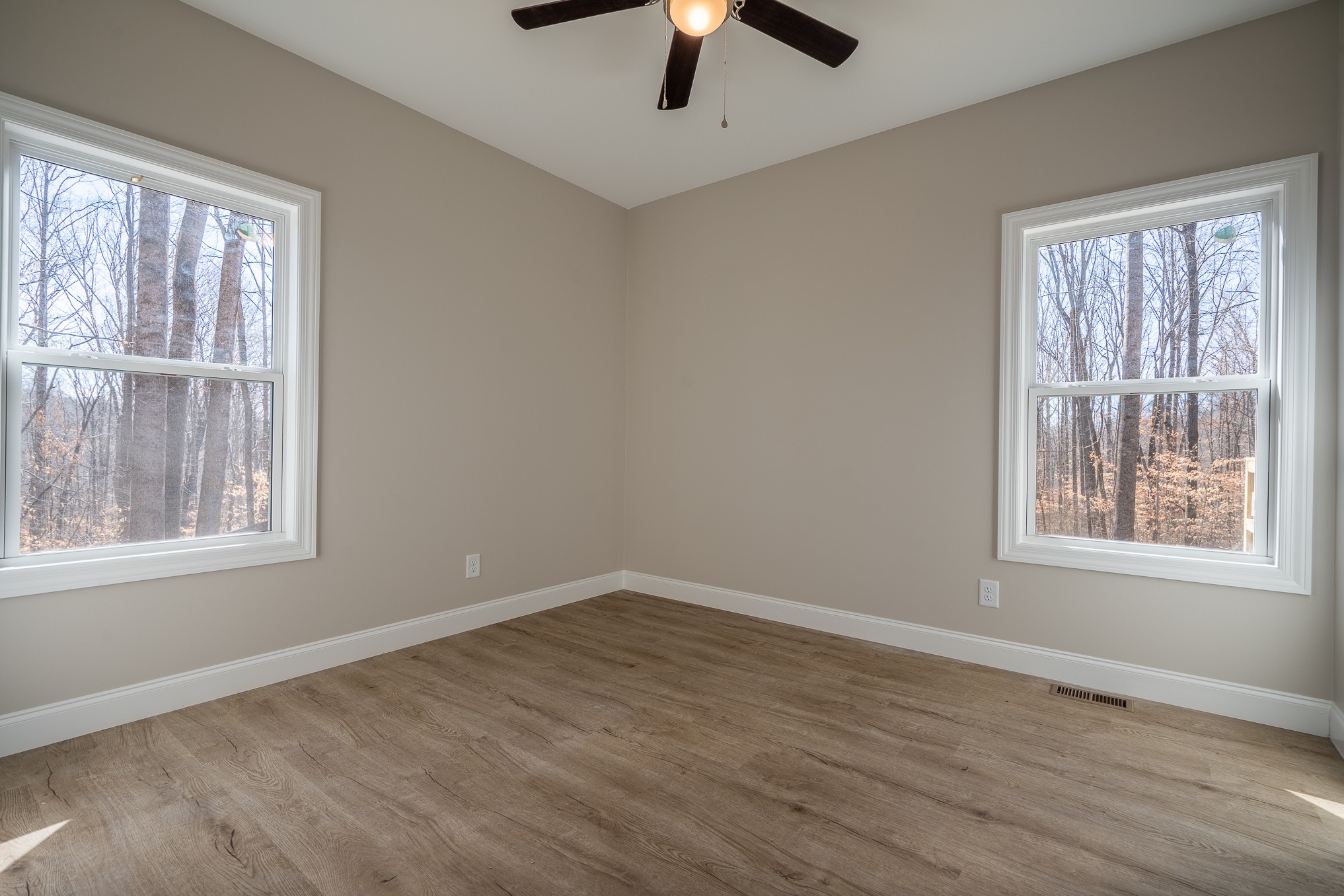 32 Periwinkle Path Leoma, TN 38468 - Photo 17 of 28 a view of an empty room with window and wooden floor