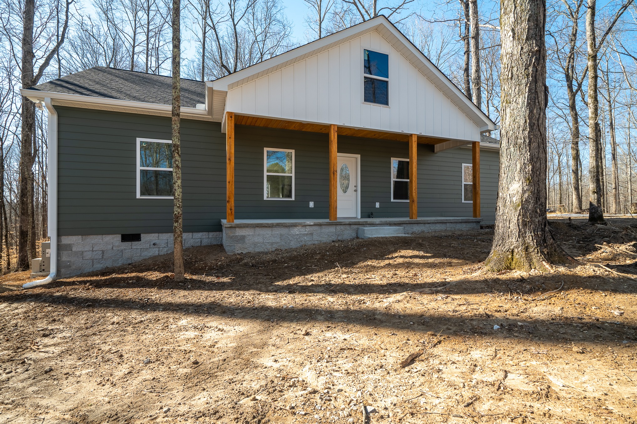 32 Periwinkle Path Leoma, TN 38468 - Photo 25 of 28 a front view of a house with a yard