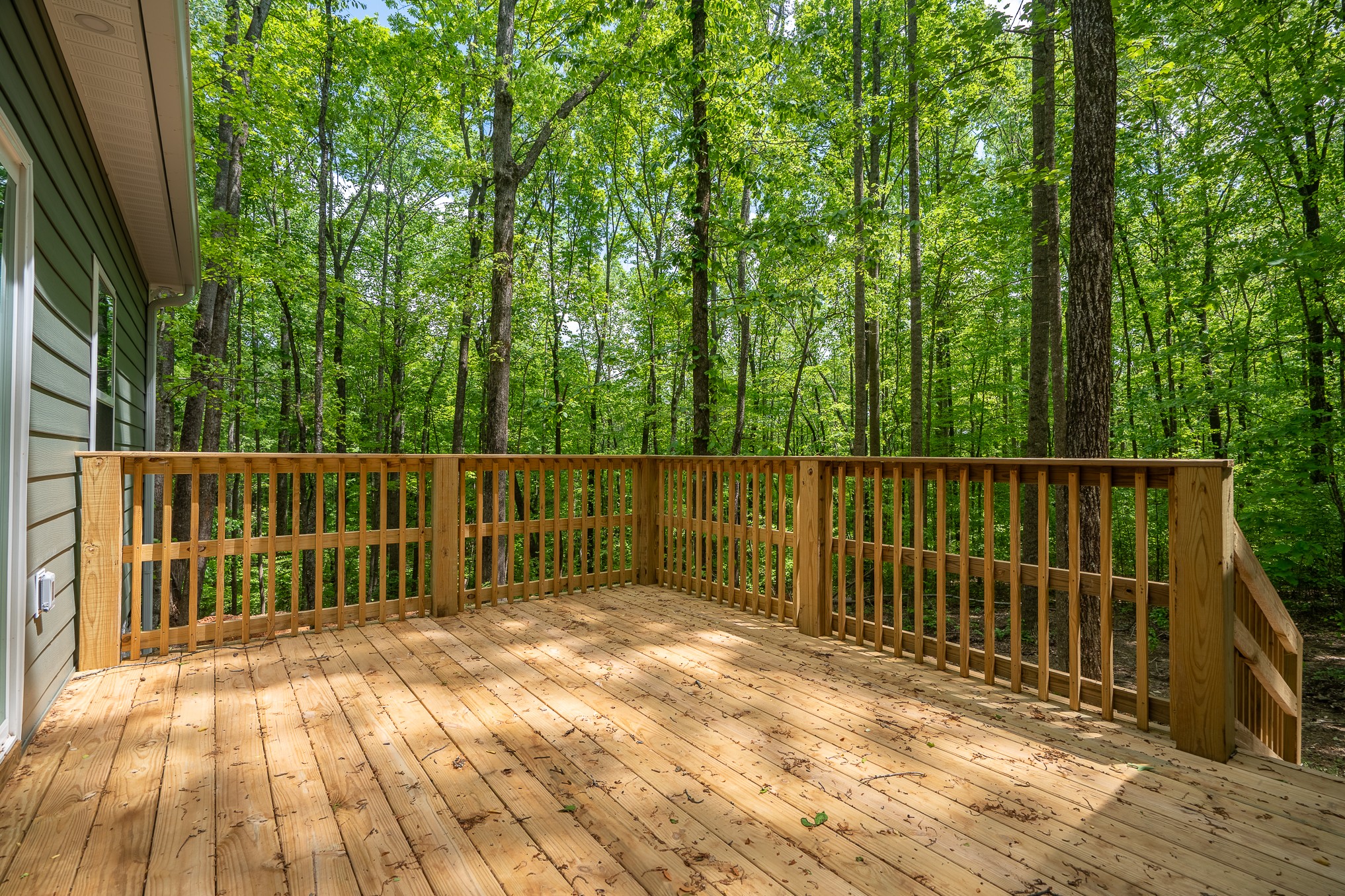 32 Periwinkle Path Leoma, TN 38468 - Photo 7 of 28 a balcony with a yard