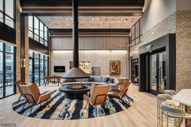 a outdoor living space with furniture and a fireplace