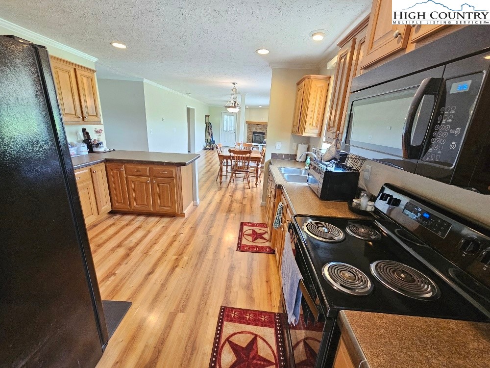459 Edwards Road Ennice, NC 28623 - Photo 12 of 36 a view of a living room and dining room